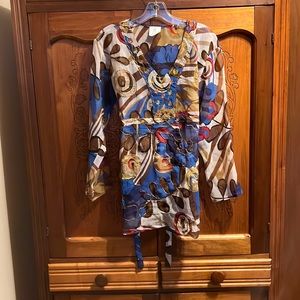 Sheer top made in India gold,silver and bronze threads for detail. Never worn.